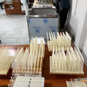 恒尔核酸鼻咽检测植绒设备佩带甩胶机烘干机等设备