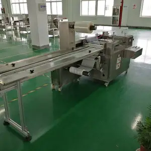4轴伺服驱动系统 PLC可编程控制器智能控制整机运行——敷料贴包装机