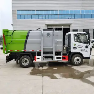 东风多利卡压缩挂桶垃圾车 对接垃圾车厂家价格表 多功能垃圾车图片