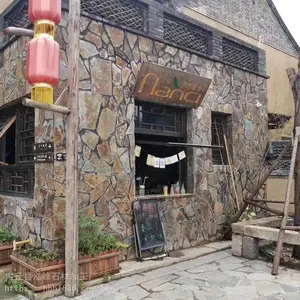 厂家供应黄色文化石火烧板 黄木纹片石 庭院铺地石
