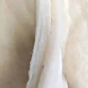 奥绒厂家定制保暖的木棉絮片针刺棉热熔棉烫光棉及木棉毡