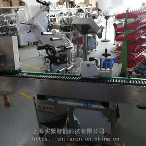 上海实繁贴标机,卧滚贴标机