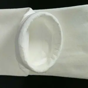 粉尘被吸附于除尘布袋表面-源泰环保除尘器
