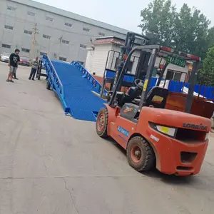 ǭ���ƶ�ʽװж������С�͵綯Һѹ����������װ��װжƽ̨б�¹̶�ƽ̨