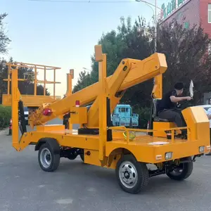 牵引式电动液压高空旋转平台车 拖车折臂升降机 曲臂自行走升降设备