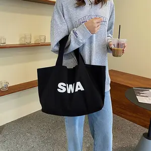 潮撘休闲包字母帆布包新款潮时尚托特包大容量购物袋包文艺范女包