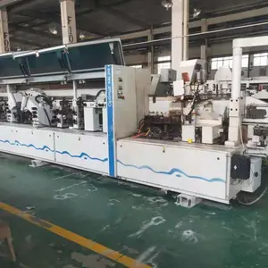 出售二手板式家具设备 豪迈310全自动直线封边机 高速重型全自动封边机