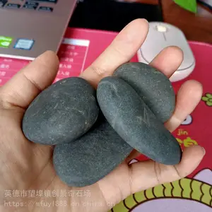 工程建筑常用石材批发-广东梅州黑色鹅卵石-打磨抛光鹅卵石案例