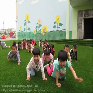 幼儿园铺地假草_施工仿真草坪_工地防尘草皮围挡