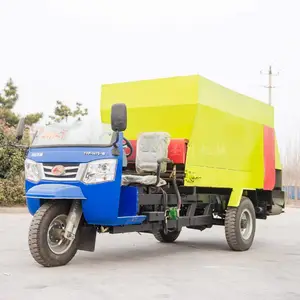 自动化饲草撒料车图片价格 养殖用饲草撒料车 三轮喂料车厂家