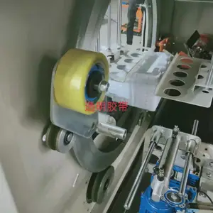 水平胶带缠绕机_透明胶带包裹_胶带缠绕包装_广西贵州云南厂家
