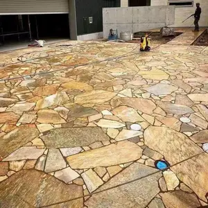黄色石片不规则碎石片 黄木纹石材贴墙背景墙碎拼石带来宁静之感