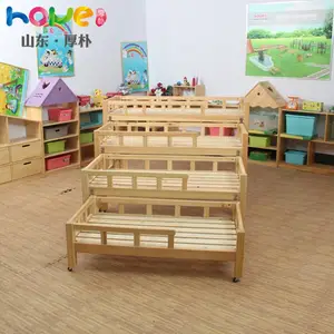 幼儿园床厂家直销 山东厚朴实木幼儿园四层推拉午睡儿童床