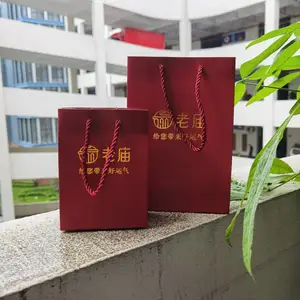 定制铜版纸袋 服装店购物袋 手提礼品袋 印刷logo 可加厚 批发