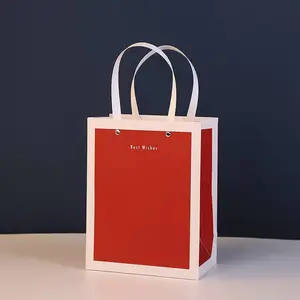 成都工厂定制纸袋 铆钉礼品袋 时尚手提袋订做尺寸文字烫金logo