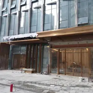 现代商业空间金属装饰工程：格栅·酒柜·门头一体化设计