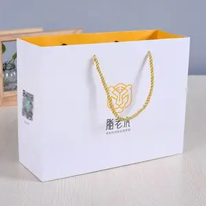 铜版纸袋 定制logo 手提购物袋 礼品袋 服装店包装袋 加厚耐用