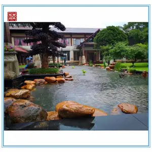 广东黄蜡石原石图片-景区摆景设计石黄蜡石-黄蜡石大量货源出售