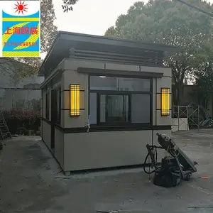 现在流行什么款式的真石漆带厕所的保安亭 幼儿园岗亭图片