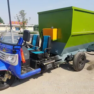 母牛喂料机 全日制粮撒料车 驾驶式机动撒料车