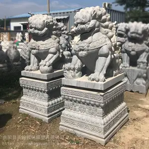 ��ʯʯͷʨ�� ������ʯ��ʨ��һ�Ի�����ʨ�ӵ�λ�ſڰڼ�