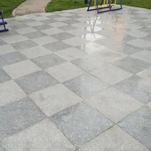 �����滨�׻��������ʯ����С���㳡���е��ذ�ש����ʯ��ש