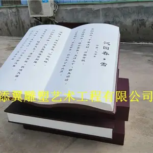 ��ѧУ԰�����˷��沣�����鱾���͵��ܰڼ�