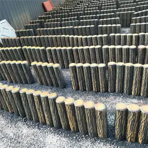 水泥仿木桩成品 绿化带仿树皮路沿桩 混凝土五联排树桩石