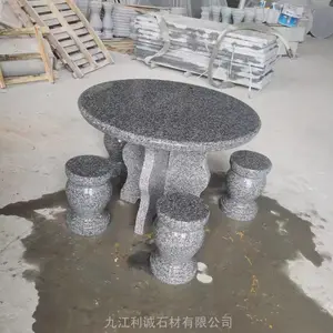 石桌石凳***格 园林工程建设石头桌子厂家