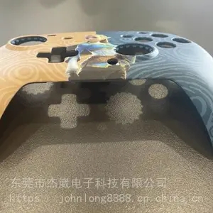 IMD技术游戏机手柄模内注塑覆膜