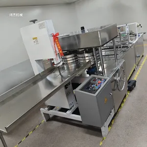 供应一次性无纺布湿巾折叠机械 厨房吸油纸抹布机器生产线 美容美发院防护垫可挖太阳孔床单机器设备源头厂家