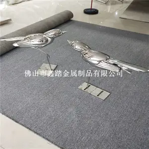 北京小区草坪装饰镜面不锈钢小鸟雕塑实物效果图
