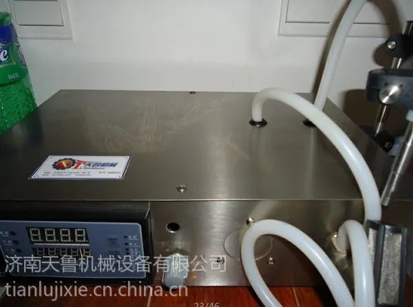 供应枣庄潍坊耐腐蚀磁力泵灌装机-山东济南药水灌装机液体灌装机 天鲁灌装机价格/灌装机厂家