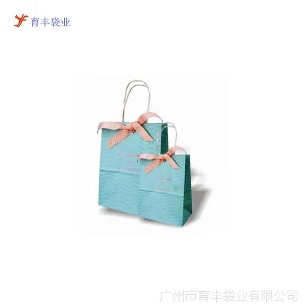 供应专业纸袋厂家订制白卡礼品纸袋 机印多色LOGO纸袋 铜板服装纸袋