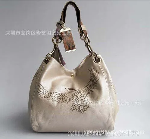 热销韩版新款个性箱包激光雕刻镂空切花冲孔加工PU真皮手袋