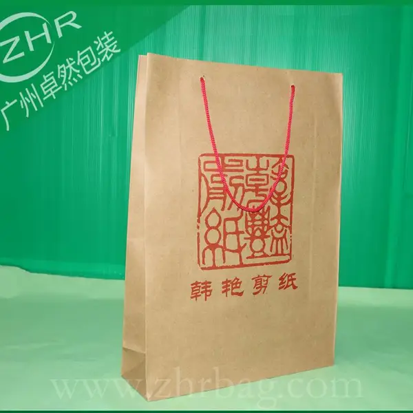 定做剪纸留空PVC窗口黄牛皮纸礼品袋160g牛皮纸一色印刷包装纸袋