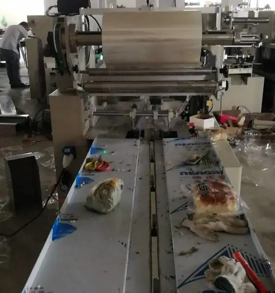 Tian月饼枕式包装机老婆饼糖果面包包装机型号zt-250型每分钟50-120包自动封口计量