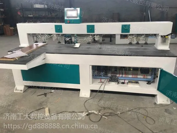 板式家具侧打孔专用机器-济南工大红外线数控侧孔机
