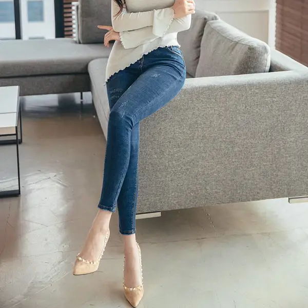 摆地摊卖小孩的衣服小脚弹力牛仔裤批发童装尾货回收平台