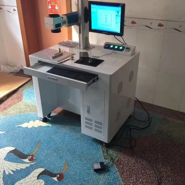 浙江杭州木头衣架激光打标机建德市金属标牌激光刻字机找光久
