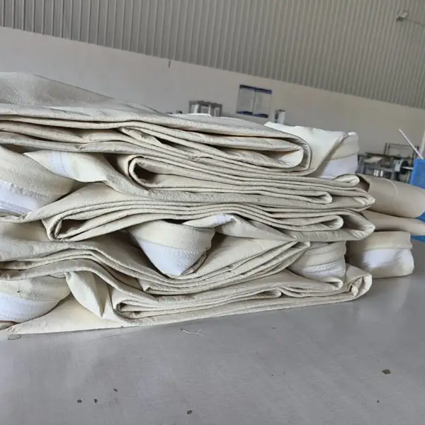 【鑫泉环保材料】化工厂脱硫脱硝配套PPS除尘滤袋 定制尺寸厂家