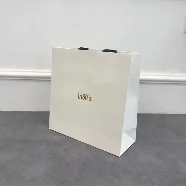 铜版纸手提礼品袋 定制印刷logo 服装店购物袋 加厚牛皮纸 可批发