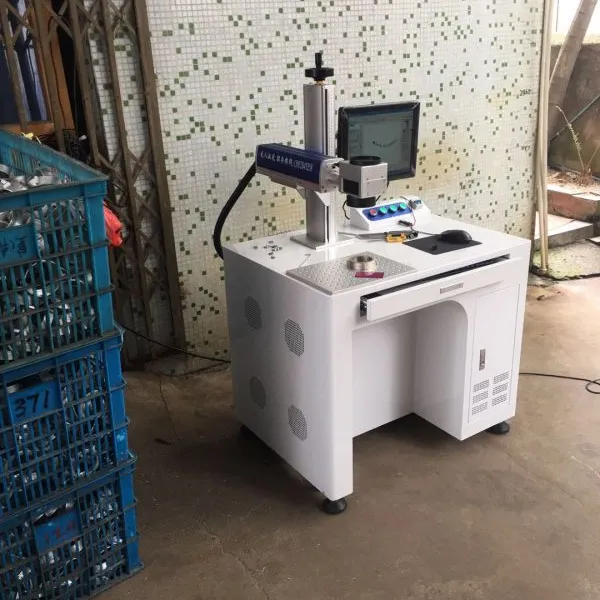 新沂市金属激光刻字机价格塑料透明激光镭射机厂家直销