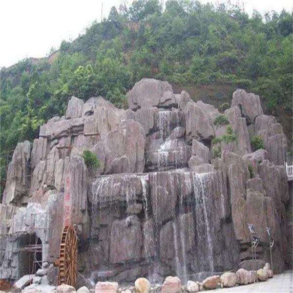 深圳水泥假山 假树设计制作 假山瀑布工程施工现场
