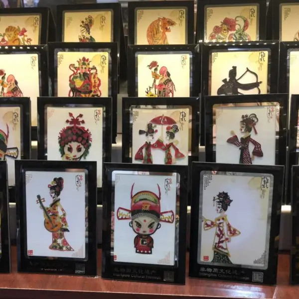 西安旅游纪念品皮影戏商务会议礼册 外事出国皮影礼品相框