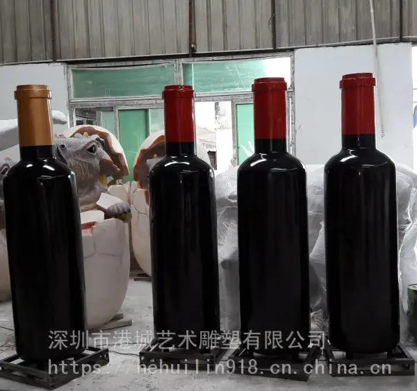 鹿鼎国际宣传装饰大型树脂酒瓶制品 港城玻璃钢红酒瓶酒桶雕塑定制厂家