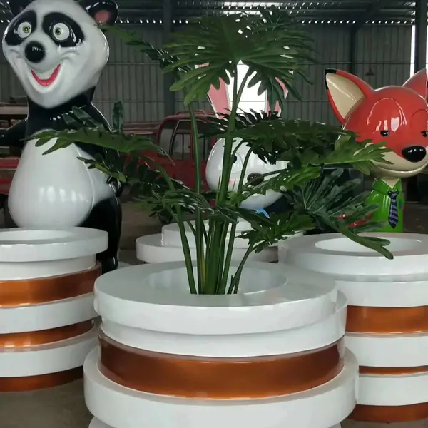 简约人物雕塑 树脂工艺品 玻璃钢化盆制作公园长凳雕塑厂家