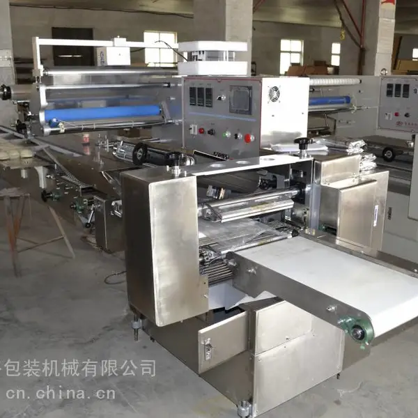 三永裕820型号大型枕式单伺服上送膜包装机方便面五连包集合包装机
