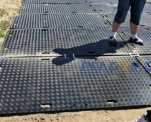 告别泥泞与钢板!新型铺路垫板掀起基建“绿色革命”轻便抗压极速铺设临时路面垫板