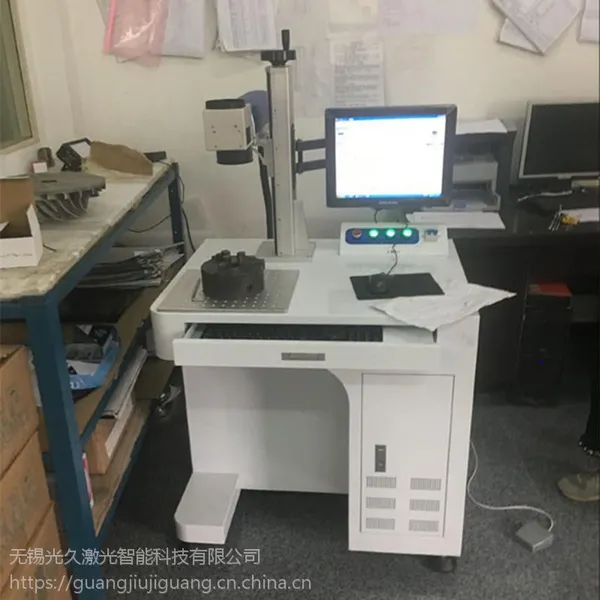 启东 海安易拉罐激光雕刻机镭射机可乐瓶雕刻图片机器找光久激光科技专家